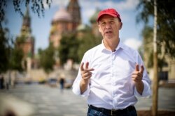 FILE - Valery Tsepkalo, a former Belarusian diplomat forced into exile, speaks during an interview near Red Square in Moscow, Russia, July 28, 2020.