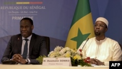 Le ministre de la Justice Ousmane Diagne (à g.) et le Premier ministre Ousmane Sonko.