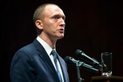 FILE - In this July 8, 2016, photo, Carter Page, then an adviser to U.S. Republican presidential candidate Donald Trump, speaks at the graduation ceremony for the New Economic School in Moscow, Russia.