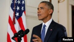 U.S. President Barack Obama announces executive actions on U.S. immigration policy during a nationally televised address from the White House in Washington, Nov. 20, 2014. 
