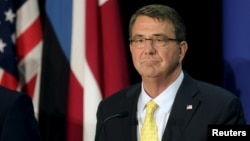U.S. Secretary of Defense Ash Carter listens during a news conference in Tallinn, Estonia, June 23, 2015.