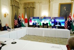 President Joe Biden speaks during a virtual meeting with Indian Prime Minister Narendra Modi, Australian Prime Minister Scott Morrison and Japanese Prime Minister Yoshihide Suga, from the State Dining Room of the White House, March 12, 2021.
