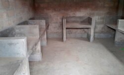 In this Dec. 19, 2019 photo, a common cooking area is seen inside a newly constructed building on Bhasan Char in the Bay of Bengal, Bangladesh.