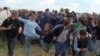Hungarian Camerawoman Indicted for 2015 Assault on Migrants