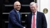 Britain's Chancellor of the Exchequer Sajid Javid shakes hands with U.S. National Security Adviser John Bolton at Downing Street in London, Britain, August 13, 2019.