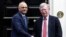 Britain's Chancellor of the Exchequer Sajid Javid shakes hands with U.S. National Security Adviser John Bolton at Downing Street in London, Britain, August 13, 2019.
