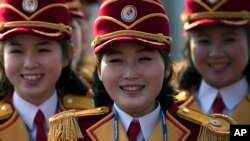 Members of the North Korea cheering group gather before a welcome ceremony inside the Gangneung Olympic Village prior to the 2018 Winter Olympics in Gangneung, South Korea, Feb. 8, 2018. 