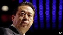 Kepala Interpol Meng Hongwei memberikan kata sambutan pada kongres dunia Interpol di Singapura, 4 Juli 2017. 