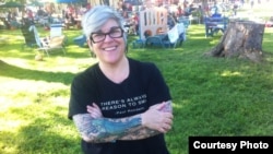 Melissa Thomas, a 47-year-old technology specialist in Washington, D.C., got her tattoos at age 40. (Anna Matteo/VOA)