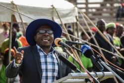 FILE - Transform Zimbabwe leader Jacob Ngarivhume gestures as he addresses a Movement for Democratic Change (MDC) Alliance launch rally at White City Stadium in Bulawayo on Sept. 2, 2017.