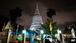 Locals wait in line overnight for free coronavirus testing at Wat Phra Si Mahathat temple in Bangkok, Thailand, July 9, 2021, as faced with rapidly rising numbers of new coronavirus infections, major Asia-Pacific cities implemented new restrictions. 