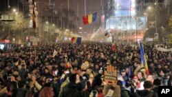 Protesters rallying against changes in tax and justice laws fill a main boulevard in Bucharest, Romania, Nov. 26, 2017.