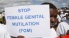 FILE - A Masai girl protests against Female Genital Mutilation (FGM) in Kilgoris, Kenya.