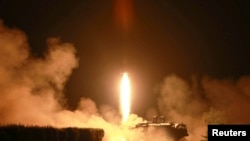 A tactical rocket firing drill carried out by units of the Korean People's Army (KPA) Strategic Force is seen during a visit by North Korean leader Kim Jong Un in the western sector of the front in this undated photo released by North Korea's Korean Centr