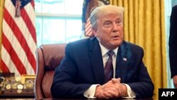 រូបឯកសារ៖ ប្រធានាធិបតីសហរដ្ឋ​​អាមេរិកលោក​ Donald Trump ថ្លែង​នៅក្នុង​ការិយាល័យ​ប្រធានាធិបតី​ក្នុង​សេតវិមាន​ នៅ​រដ្ឋធានី​វ៉ាស៊ីនតោន កាលពី​ថ្ងៃទី ១១ ខែកញ្ញា ឆ្នាំ ២០២០។