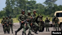 Members of the National Guard take part in a military exercise in Garcia Hevia airport in La Fria, Venezuela, Sept. 10, 2019.