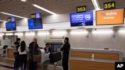 Israelis prepare to fly to Dubai at the Ben Gurion airport near Tel Aviv, Israel, Dec. 3, 2020. 