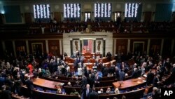 House members vote on the House resolution to move forward with procedures for the next phase of the impeachment inquiry into President Trump in the House Chamber on Capitol Hill in Washington, Oct. 31, 2019.