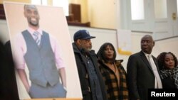 Rodney Wells, stepfather, and RowVaughn Wells mother of Tyre Nichols, take the stage with their attorney Ben Crump, during a news conference at Mt. Olive Cathedral CME Church in Memphis, Tennessee, Jan. 27, 2023.
