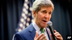 U.S. Secretary of State John Kerry speaks to U.S. Embassy staff in Riyadh, Saudi Arabia, Sunday, Jan. 24, 2016, before leaving Saudi Arabia. Kerry is in Saudi Arabia on the second leg of his latest round-the-world diplomatic mission, which will also take him to Laos, Cambodia and China. (AP Photo/Jacquelyn Martin, Pool)