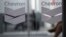 FILE - Chevron Global Technology Services Company logos are seen at an administrative office in Caracas, Venezuela, on Nov. 29, 2022. 