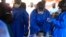 FILE - Health care workers from the World Health Organization prepare to give an Ebola vaccination to a front-line aid worker in Beni, Democratic Republic of the Congo, Aug 10, 2018. 