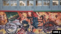 জাতিসংঘ মানবাধিকার বিষয়ক হাইকমিশনারের প্রতিবেদনের প্রচ্ছদে গত বছর জুলাই-অগাস্ট মাসে সরকার-বিরোধী বিক্ষোভের এক দেয়াল অঙ্কন। 