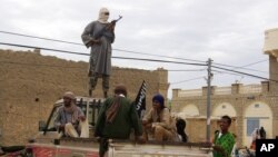 Des combattants d'Ansar Dine à Tombouctou, le 21 août 2012. (AP Photo, File)