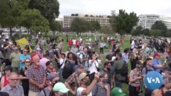 Massive Police Presence Keeps Peace at J6 Rally