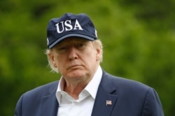 President Donald Trump walks on the South Lawn of the White House after stepping off Marine One, May 3, 2020, in Washington.