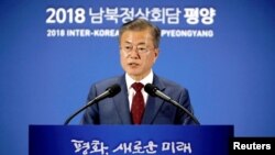 남북정상회담 일정을 마치고 귀국한 문재인 한국 대통령이 20일 서울 중구 ‘2018 남북정상회담 평양’ 서울 프레스센터에서 대국민 보고를 하고 있다. 