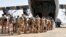 FILE - The last French soldiers board a French military plane to leave Niger for good, at the French base which was handed over to the Nigerien army, in Niamey, Niger, on Dec. 22, 2023.