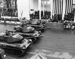 Tanks pass the inaugural parade reviewing stand of President Dwight D. Eisenhower on Jan. 21, 1957 in Washington. (Eisenhower Library)