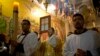 Christian clergymen participate in the Easter Sunday procession at the Church of the Holy Sepulchre, traditionally believed by many to be the site of the crucifixion and burial of Jesus Christ, in Jerusalem's Old City, Israel, March 27, 2016.