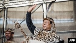 FILE - Zulu King Goodwill Zwelithini greets his supporters at The Moses Mabhida Football Stadium in Durban, South Africa, Oct. 7, 2018.