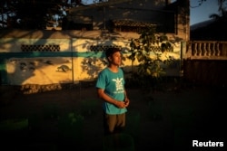 The Wider Image: Love of sea turtles turns Philippine poachers into protectors