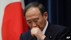 Japanese Prime Minister Yoshihide Suga holds a news conference at his office in Tokyo, Thursday, Sept. 9, 2021. Japan announced Thursday it is extending a coronavirus state of emergency in Tokyo and 18 other areas until the end of September as…
