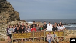 Dr. William Finlay (seated right) on a hike with a study-abroad group in South Africa.