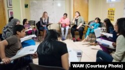 A discussion group at Women for Afghan Women headquarters in Queens, New York. (Credit: WAW)