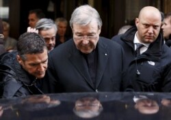 Australian Cardinal George Pell leaves at the end of a meeting with the victims of sex abuse, at the Quirinale hotel in Rome, Italy, March 3, 2016.