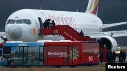 Swiss authorities detained the hijacker of an Ethiopian Airlines flight that was forced to land at Geneva's international airport, Feb. 17, 2014.