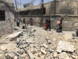 Much of the Old City of Mosul is in ruins as Iraqi civilians flee fighting between Iraqi forces and Islamic State militants, July 1, 2017.