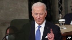 President Joe Biden speaks to a joint session of Congress Wednesday, April 28, 2021, in the House Chamber at the U.S. Capitol in Washington. (Michael Reynolds/Pool via AP)