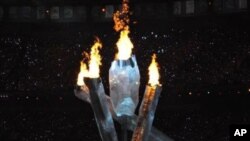 The Olympic Cauldron ignited inside the stadium in Vancouver, Canada, 12 Feb 2010