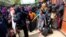 FILE - Rohingya refugees collect aid supplies including food and medicine, sent from Malaysia, at Kutupalang Unregistered Refugee Camp in Cox’s Bazar, Bangladesh, Feb. 15, 2017.