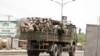 FILE - Soldiers are seen on a truck along a road in Maiduguri in Borno State, Nigeria.