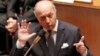 FILE - French Foreign Minister Laurent Fabius addresses members of parliament during questions to the government at the National Assembly in Paris, Oct. 9, 2013.