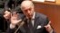 FILE - French Foreign Minister Laurent Fabius addresses members of parliament during questions to the government at the National Assembly in Paris, Oct. 9, 2013.