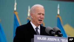 President-elect Joe Biden speaks at the Major Joseph R. "Beau" Biden III National Guard/Reserve Center, Tuesday, Jan. 19, 2021, in New Castle, Del. (AP Photo/Evan Vucci)