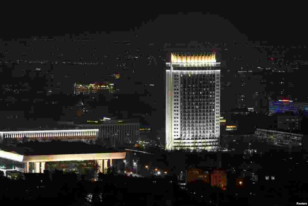The hotel "Kazakhstan" is seen before the lights are switched off for Earth Hour in Almaty, Kazakhstan, March 30, 2019. 